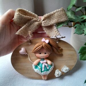 Enfeite de Porta Boneca